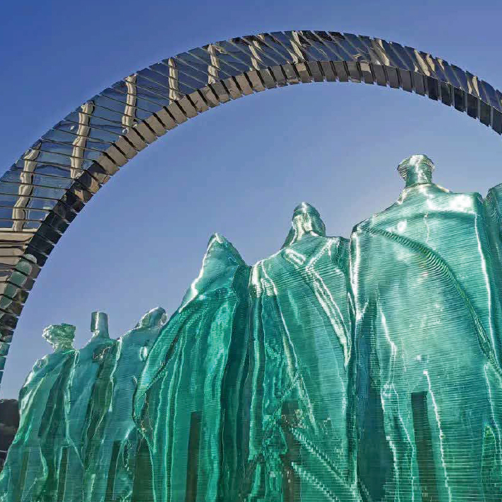 Poly Real Estate crescent-shaped sculpture